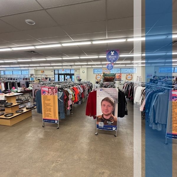 Inside of the store of the Rittman Goodwill location, with racks of clothing and displays of home goods