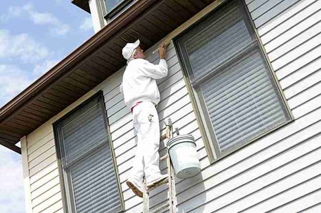 exterior-house-painter-on-ladder-painting-trim-800w.jpg