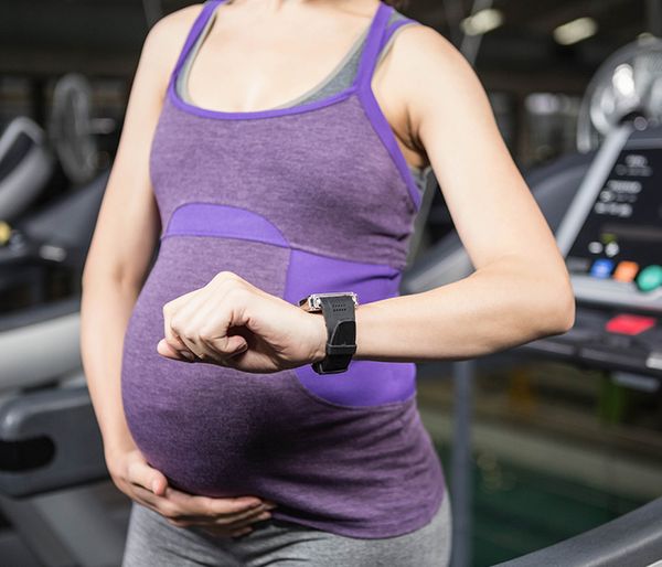 Image of a pregnant woman working out