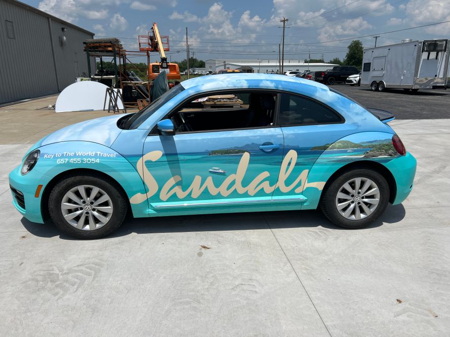a wrapped vehicle 77256766201__8DC554E6-FDAF-40C6-976E-4BCAB87AB743.jpeg