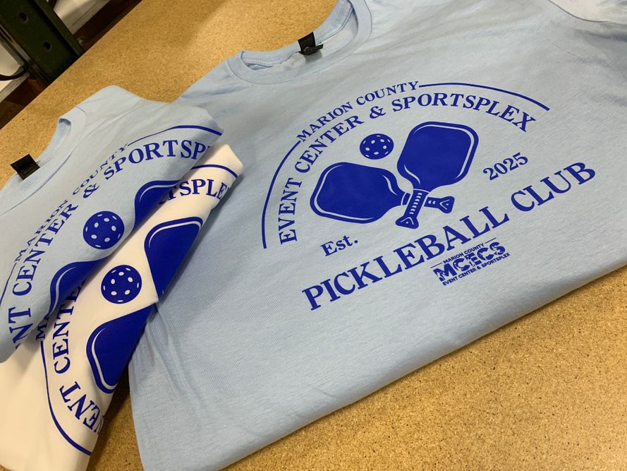 three shirts with promotional pickleball tournament print 8337 Marion County Event Center & Sportsplex.jpeg