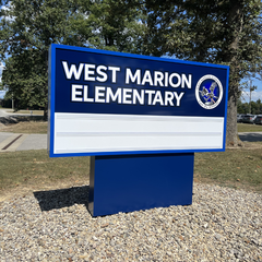 sign outside a school Copy of Images - Square - Bottom Gradient (8).png