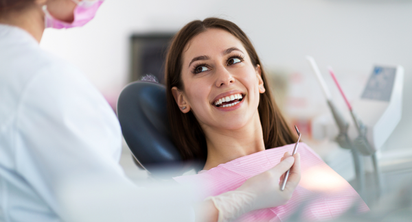 Woman smiling at the dentist