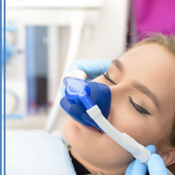 A woman being given nitrous oxide