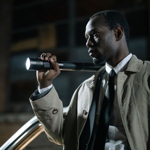 private investigator with a flashlight private investigator with a flashlight