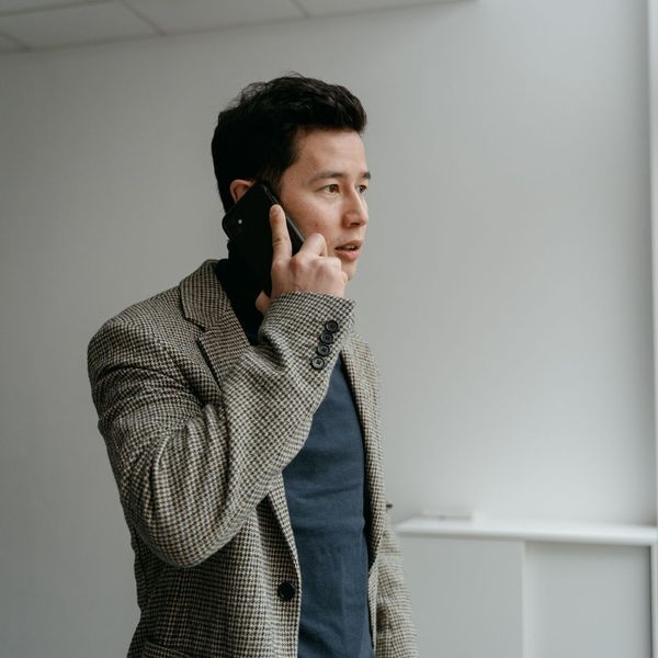 private investigator on the phone with a client
