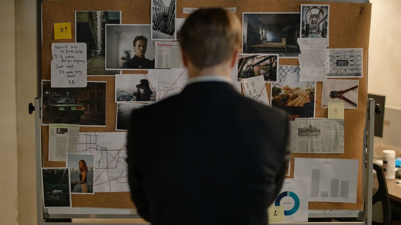 private investigator looking at evidence
