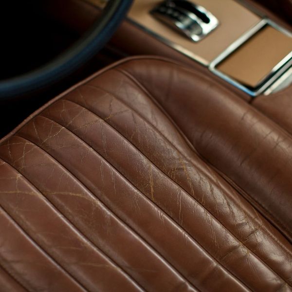 close up of old car leather seat