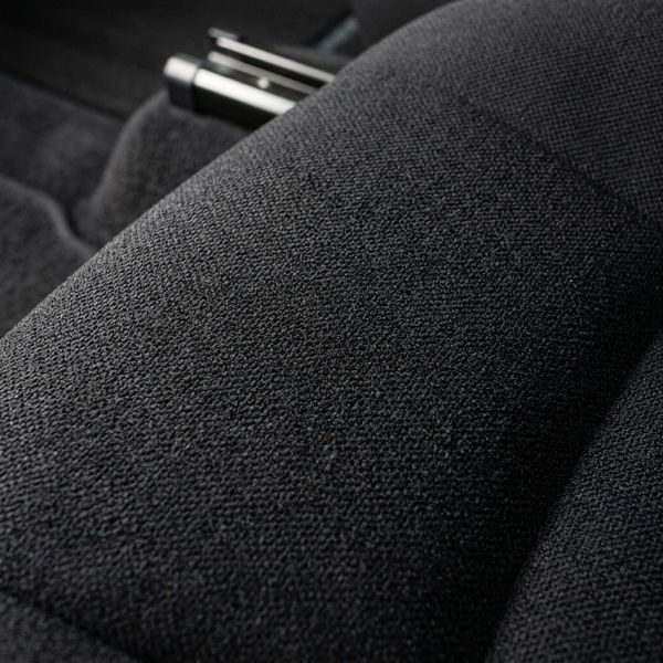 close up of a seat in a car that is extremely clean