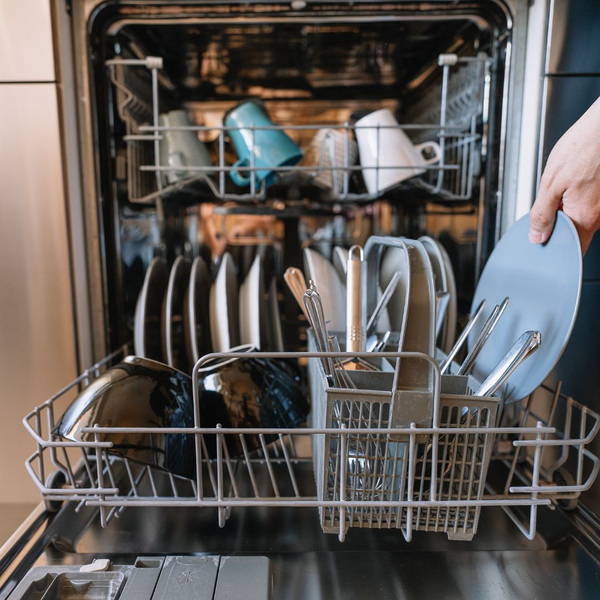 checking dishes in dishwasher