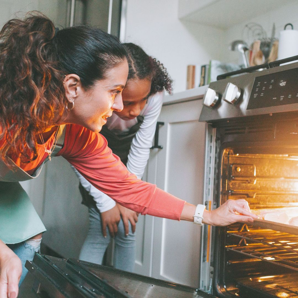 A mom and daughter baking