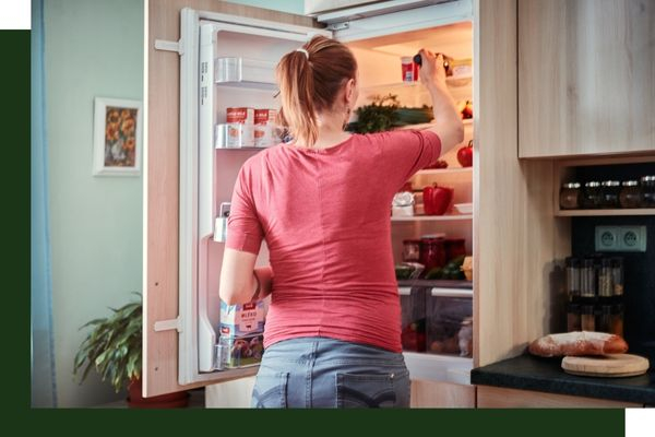 woman looking in fridge woman looking in fridge