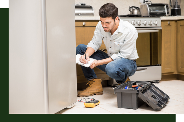 man working on a freezer