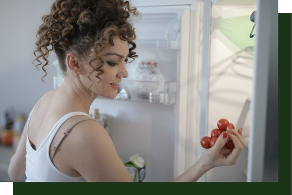 woman looking in fridge woman looking in fridge