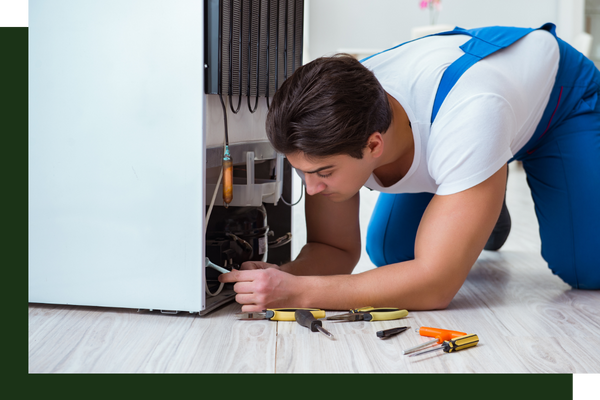technician diagnosing and issue with a residential freezer