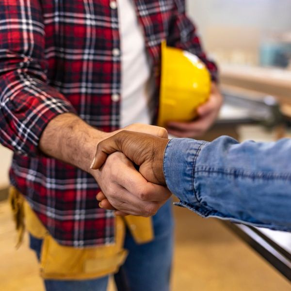 contractor and client handshake