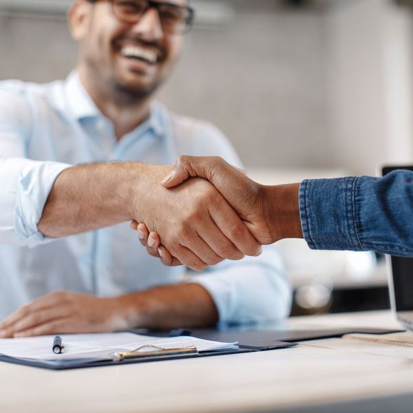 Two businessmen shaking hands