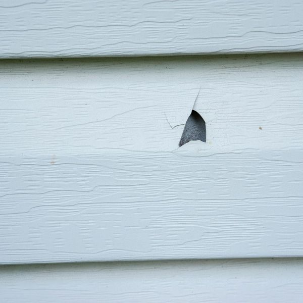 hole in siding