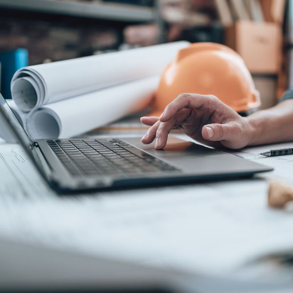 construction engineer at his desk on computer