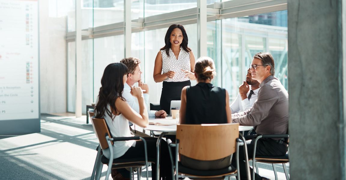 A safety meeting in a modern office