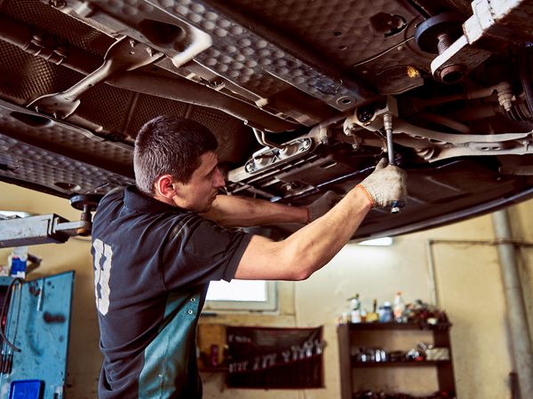 Mechanic working on car