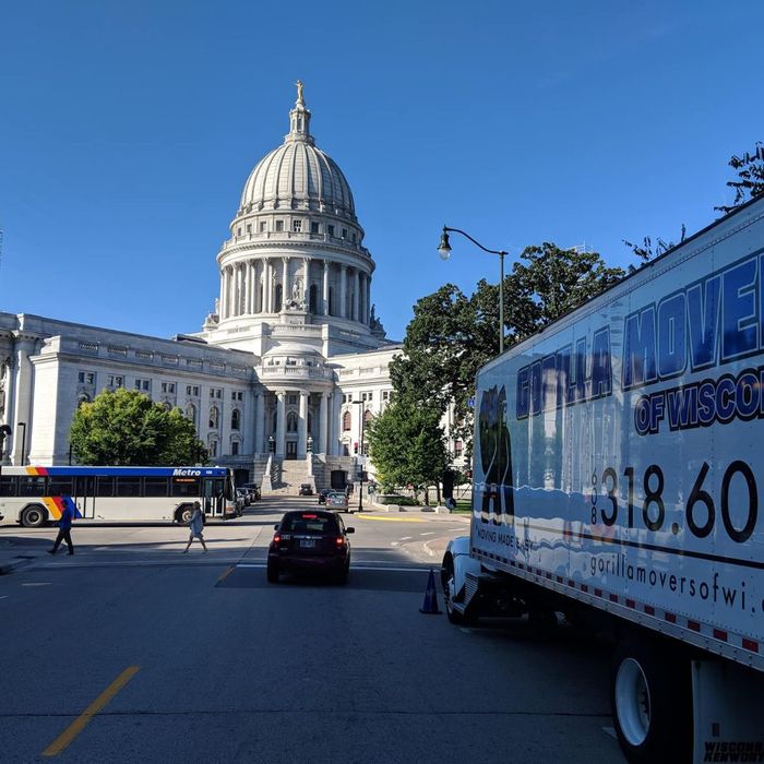 professional moving truck outside capitol