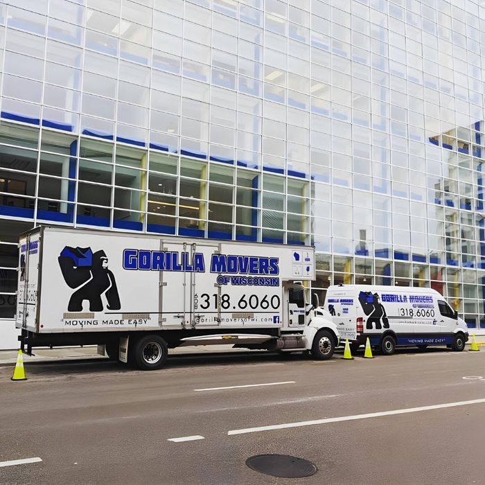 Gorilla Movers trucks in front of commercial building