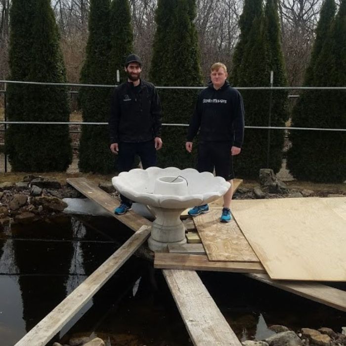 professional movers moving stone fountain