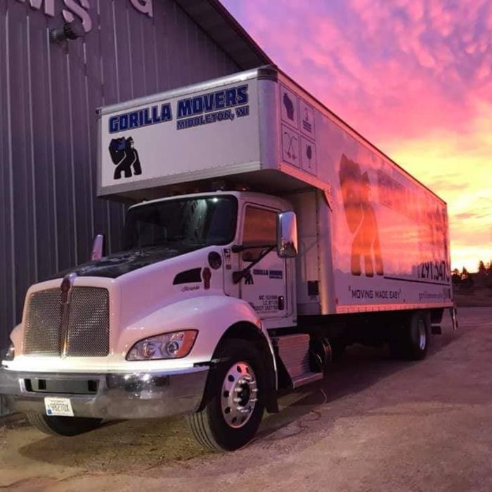 moving truck outside in sunset