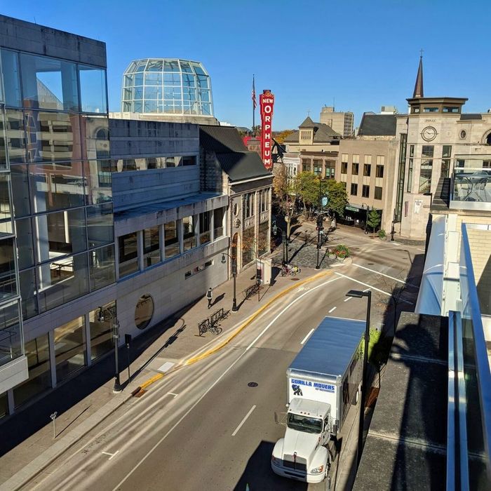 a street in Madison, WI with The Orpheum Theater included