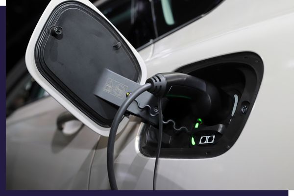 EV charger plugged into car