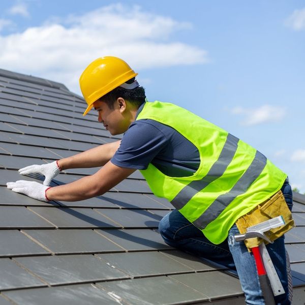 a roofer working on a new roof