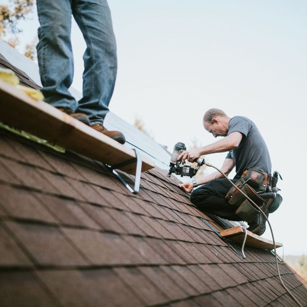 roofing contractor performing repairs