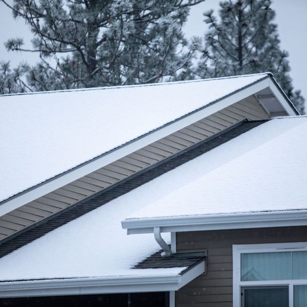pitched roof covered in snow
