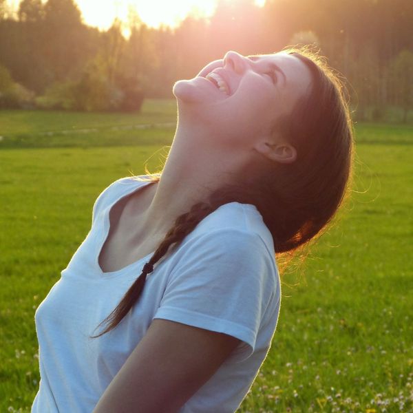 Woman laughing.