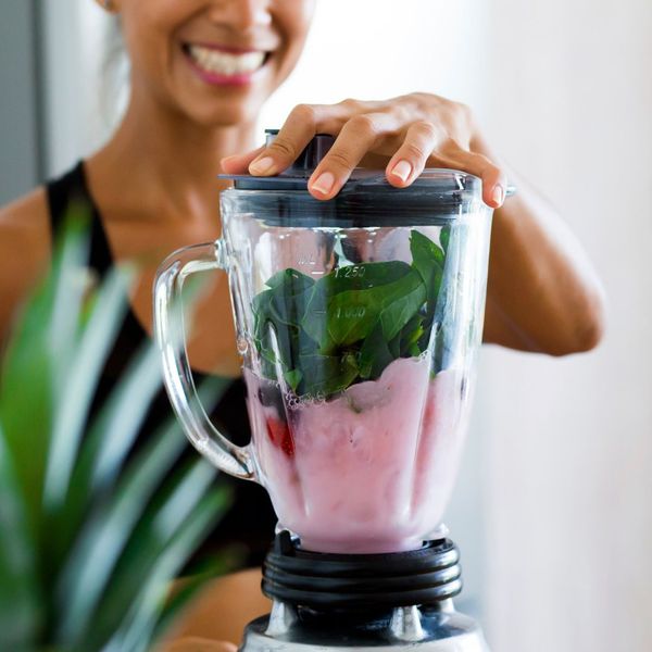 Woman making a smoothie