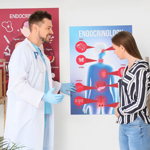 Endocrinologist with a patient