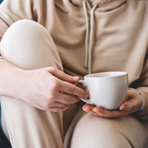 person holding cup