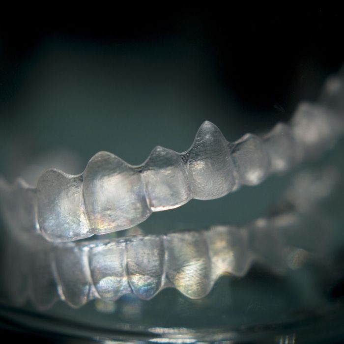 close up of clear teeth aligning tray Aesthetic Advantage of Invisalign 2.jpg