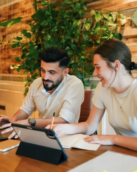 employees working in office next to plant