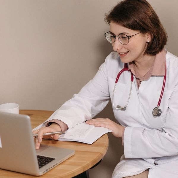 doctor talking to a telehealth patient