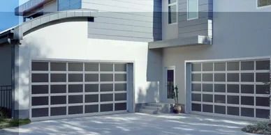 Aluminum and glass garage doors create a modern garage door look. Full View Glass Garage Doors