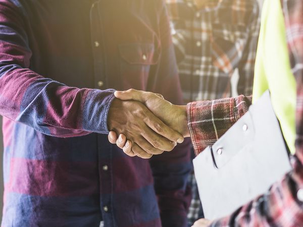 Man shaking hands with contractor