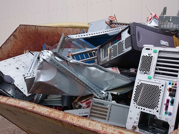 Bin full of trashed computer equipment