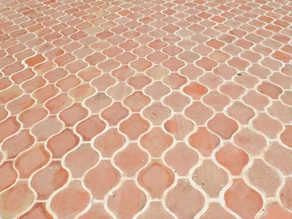 Reddish-pink ceramic tile floors