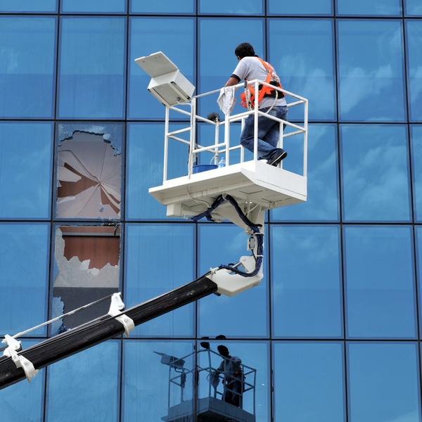 repairing skyscraper window