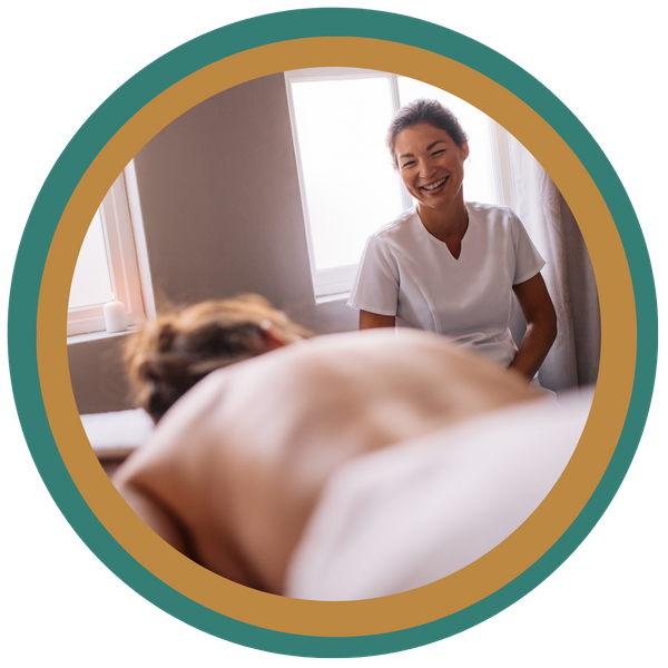 Woman with massage therapist