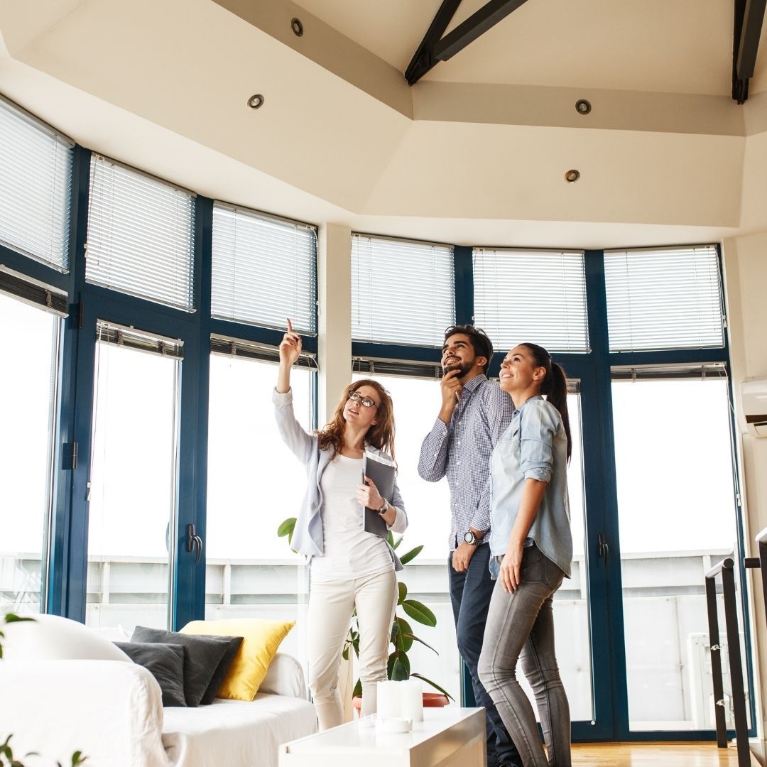 A couple looking at a home for sale