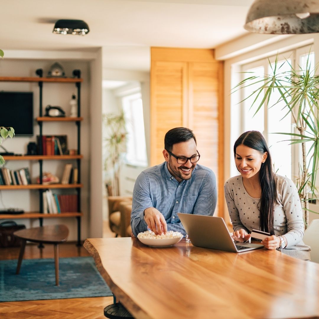 A couple looking at a computer