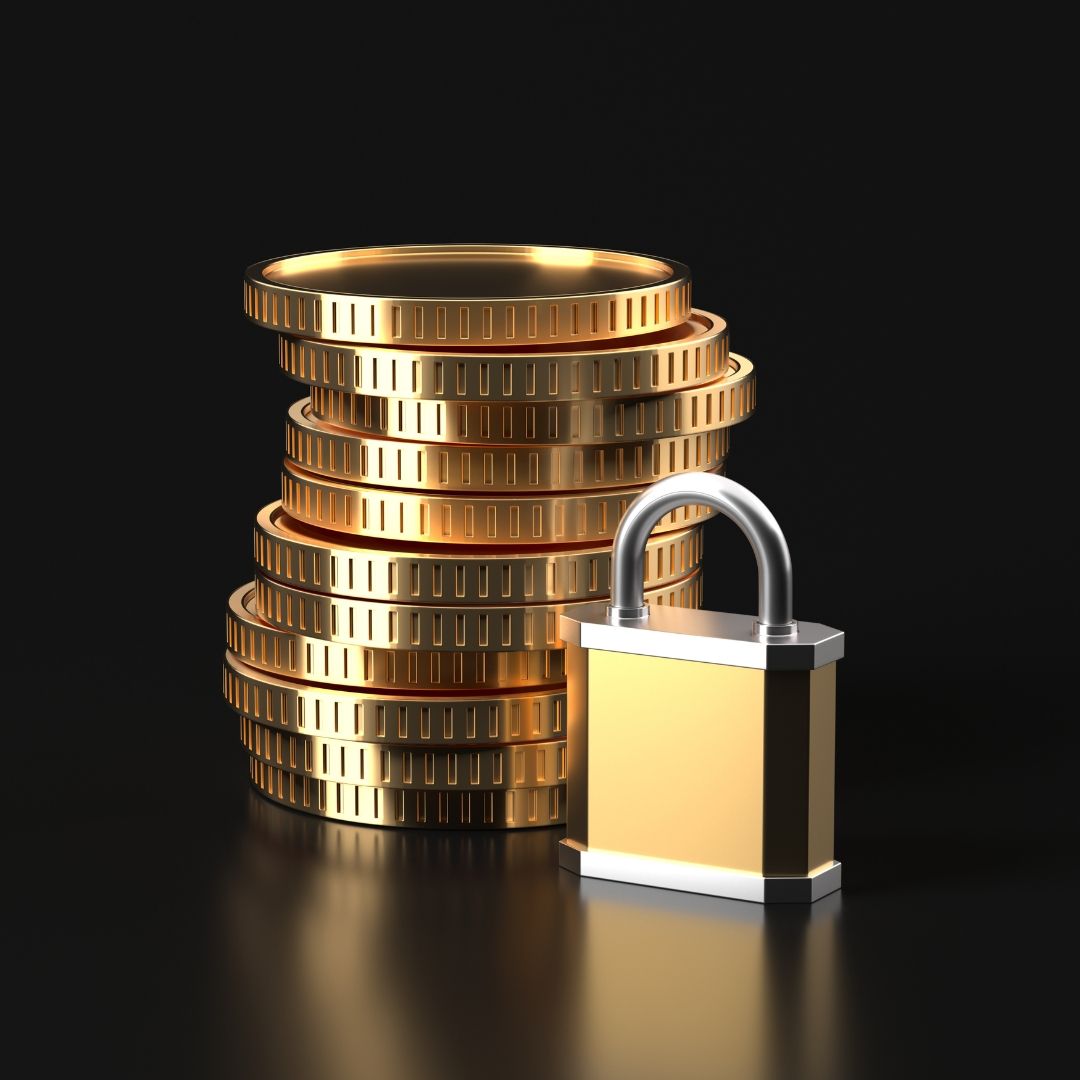 Stack of coins next to a lock